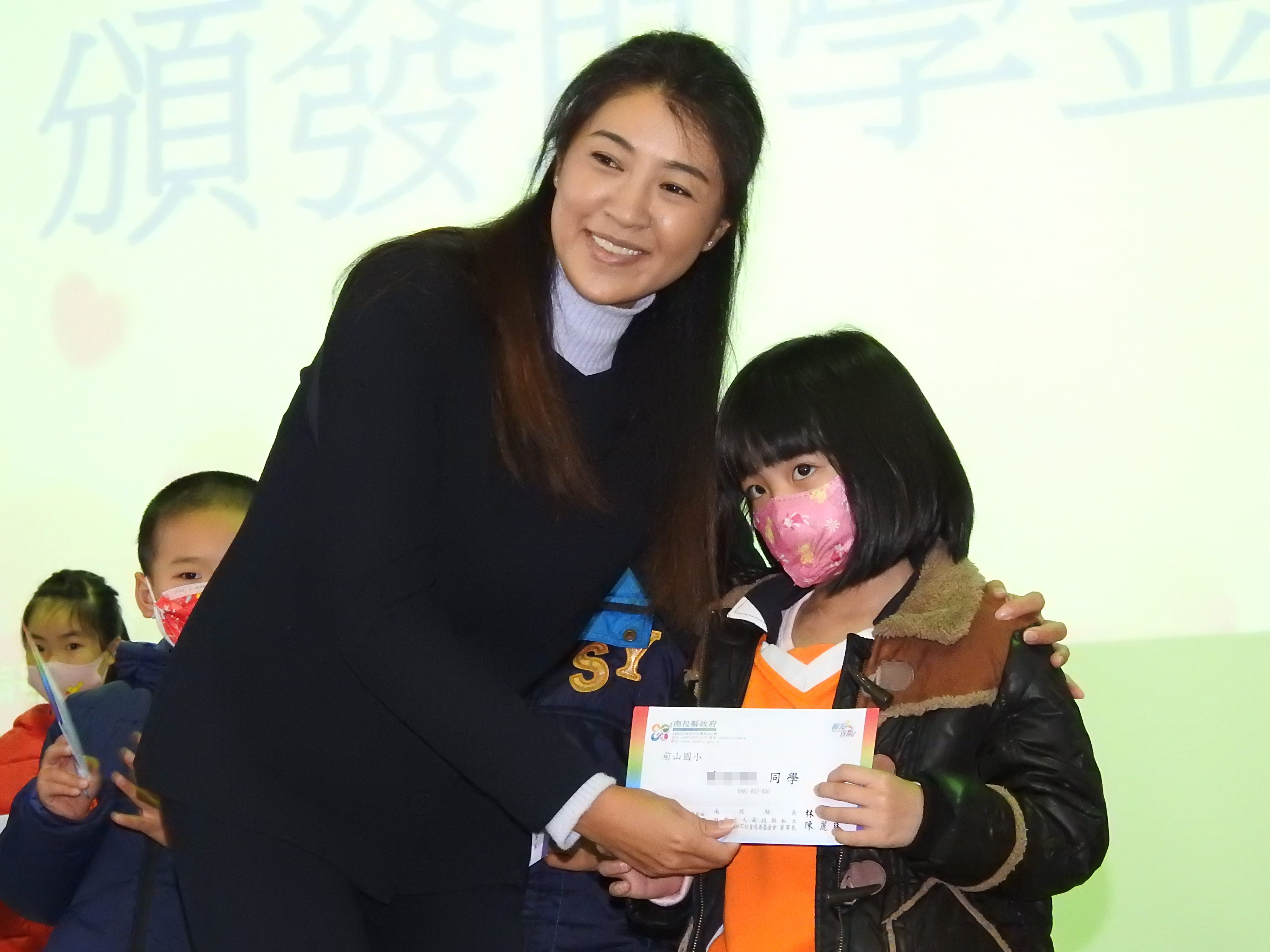 other image2-“Helping Students to Study” – Giving study grants to 202 students. County Magistrate Lin participates in all 6 sessions, December 27